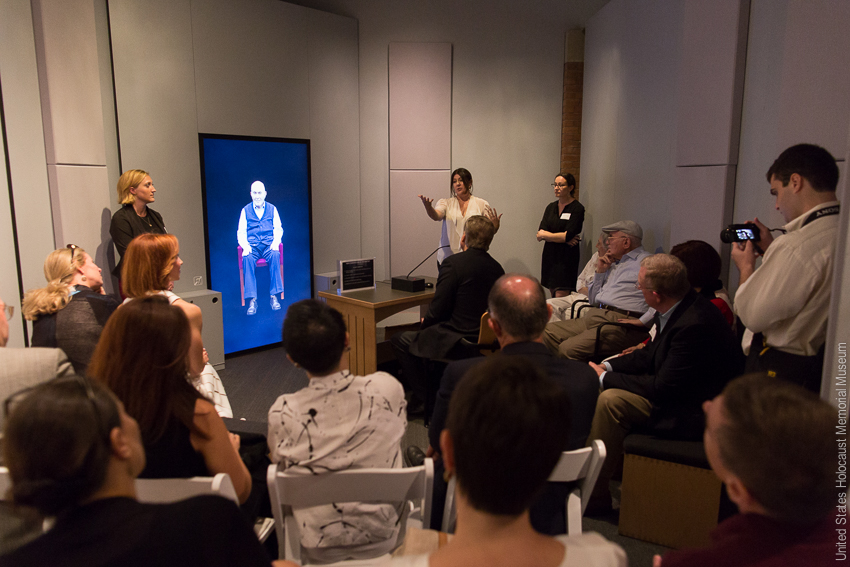Staff from USC Shoah Foundation as well as Holocaust Survivor Pinchas Gutter visit the New Dimensions in Testimony display. Photo Credit:U.S. Holocaust Memorial Museum