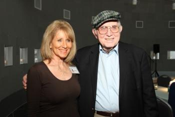 Pinchas Gutter and museum docent Doris Lazarus. Photo courtesy of Illinois Holocaust Museum and Education Center. 
