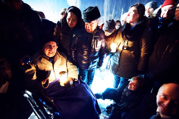 Holocaust survivor Dario Gabbai speaking near the crematoriums. 