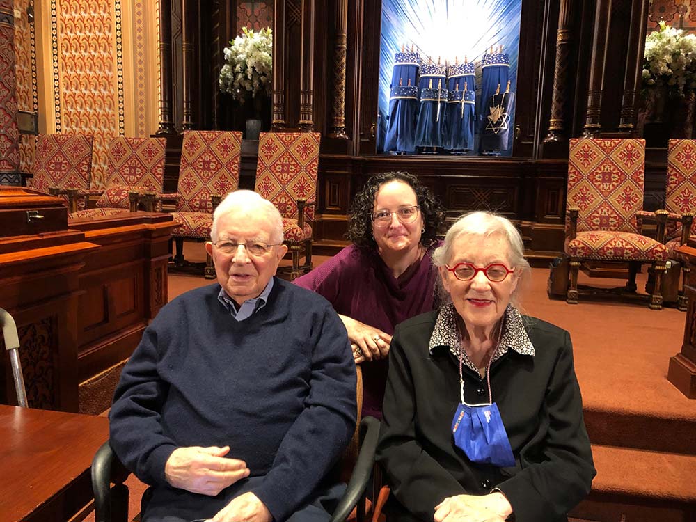 Walter and Phyllis Loeb were honored that Rabbi Nicole Auerbach walked them to the bima for Walter to record his interview.