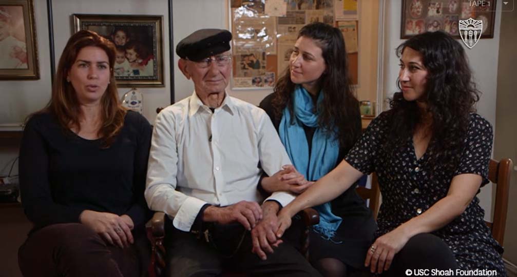 Joshua Kaufman, with three of  his daughters, Malkie, Rachel, and Alexandra, who sat with him during his 2017 interview.