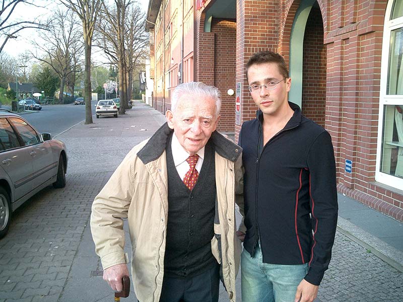 Yuval David and his grandfather, Yosef Bienenstock, went on aspeaking tour in Germany for the 65th anniversary of the liberation of the camps. Yuval started appearing on panels with his grandfather as a child.