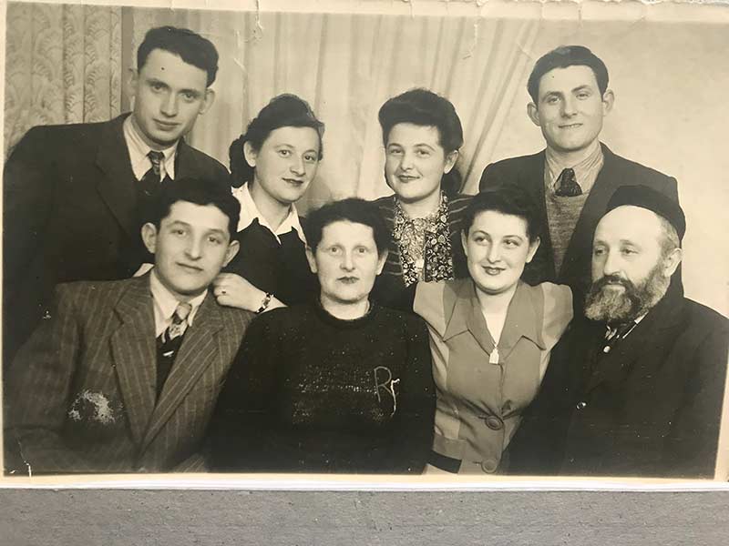 The four older siblings and their parents survived in Siberia. Eli and some 80 family members were killed in the Holocaust. In a displaced person camp in Neu Ulm, Germany, in 1948: (top row) Oscar and Anne Novak, Sally and Morris Singer, (bottom row), Sol Fink, Shaindel Fink, Ruth Zimmer, Zecharia Fink.