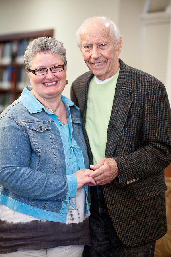 Curt Lowens poses with audience member Deb Bowen.