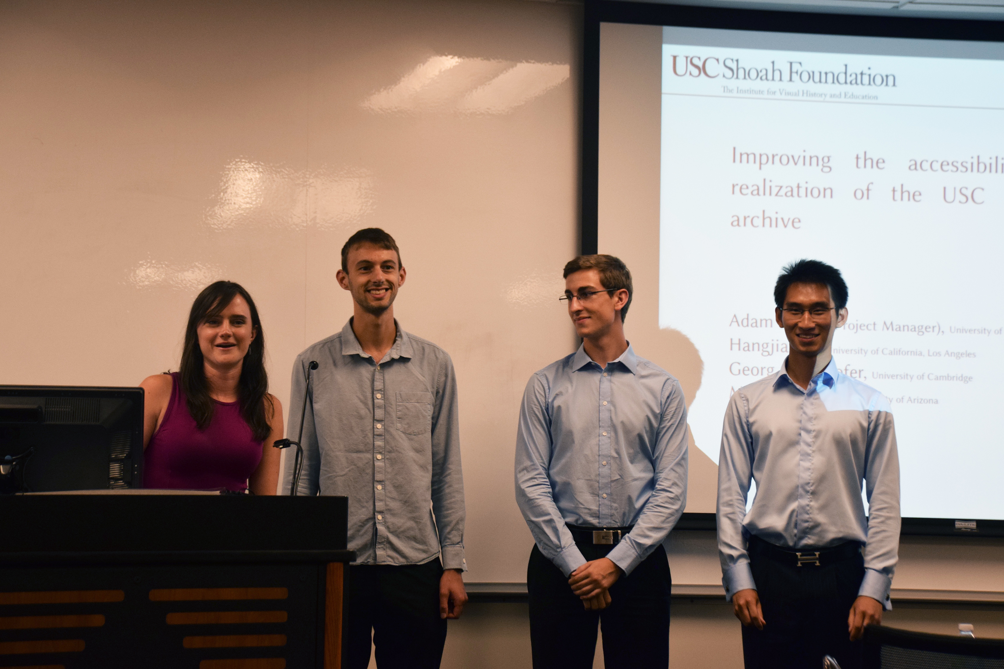 From left: Megan Shearer, Adam Foster, Georg Maierhofer, and Hangjian Li present their project to USC Shoah Foundation staff