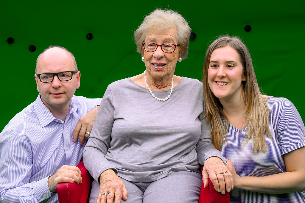 Eva Schloss (seated) with her granddaughter and Stephen Smith