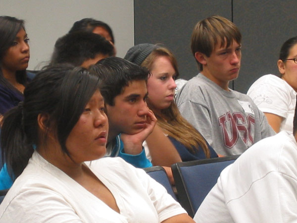 Students from the GEAR UP program at Mission Hills High School listening to Holocaust survivor Renée Firestone.