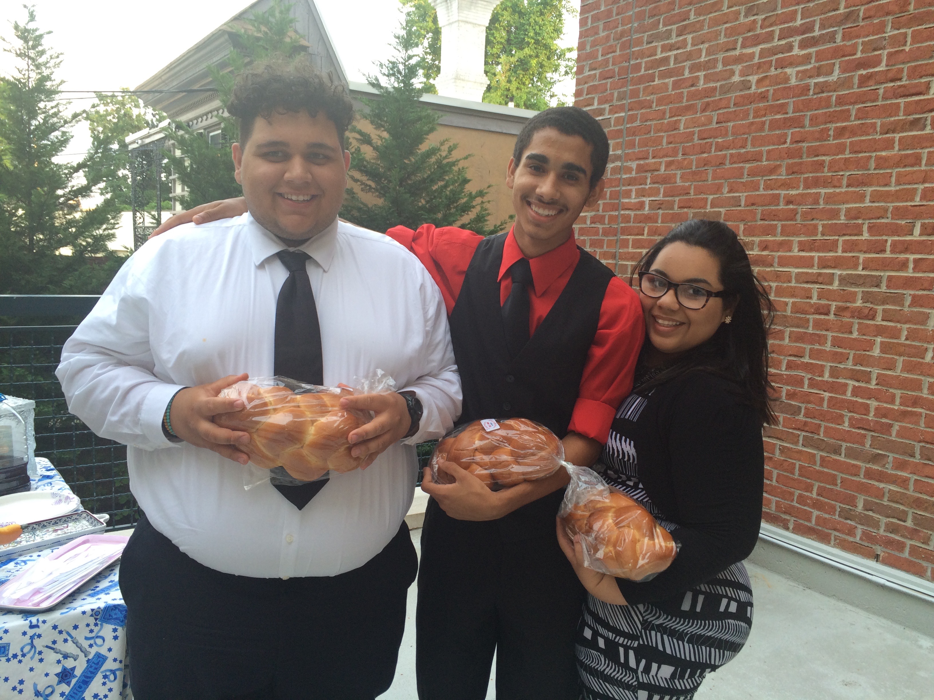 Quinten, Justin and Dory with their challah bread