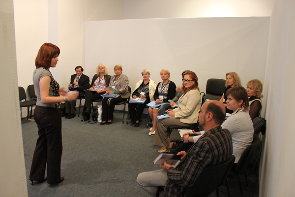 Anna Lenchovska (left), USC Shoah Foundation Institute Regional Consultant in Ukraine, speaks with educators at the Pain of Memory training seminar.