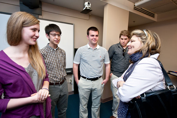 June Beallor, a founding Executive Director of the Institute, speaks with the Manovill Holocaust History Fellows.