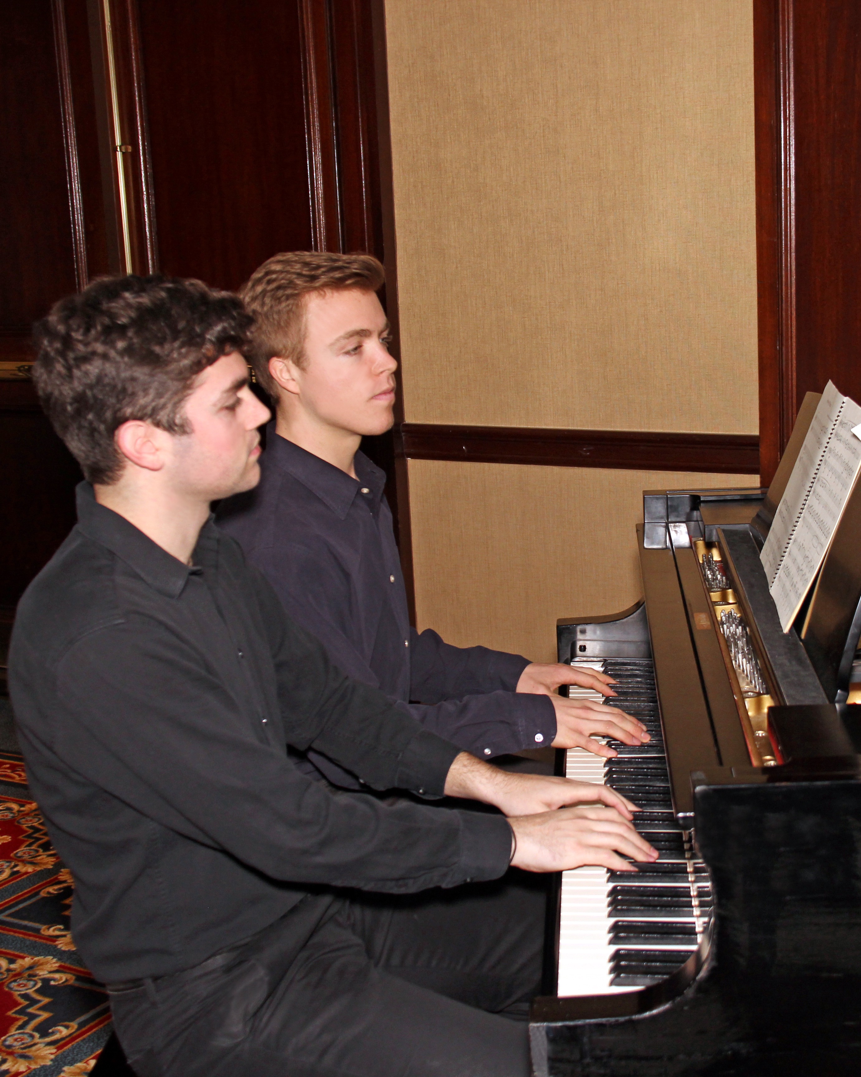 Ambrose Soehn (L) and Alex Biniaz-Harrs (R) performing their composition.