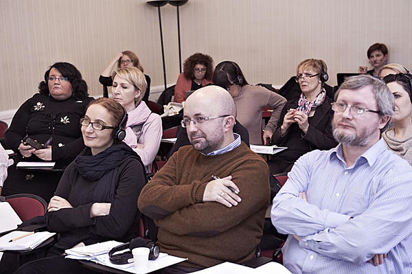 Participants listen to Martins Šmok's presentation on the influence of media and propaganda.