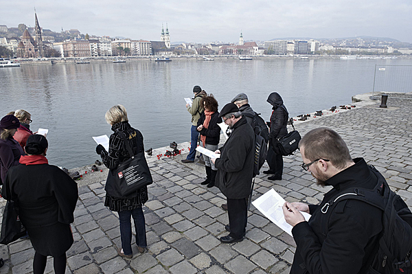 Participants read fragments of survivor testimonies about the Danube Bank massacre.