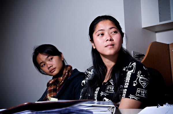 Bunthy Chey (left) and Fatily Sa (right), interns from the Documentation Center of Cambodia (DC-Cam), attending a training session on indexing video testimony (2009).