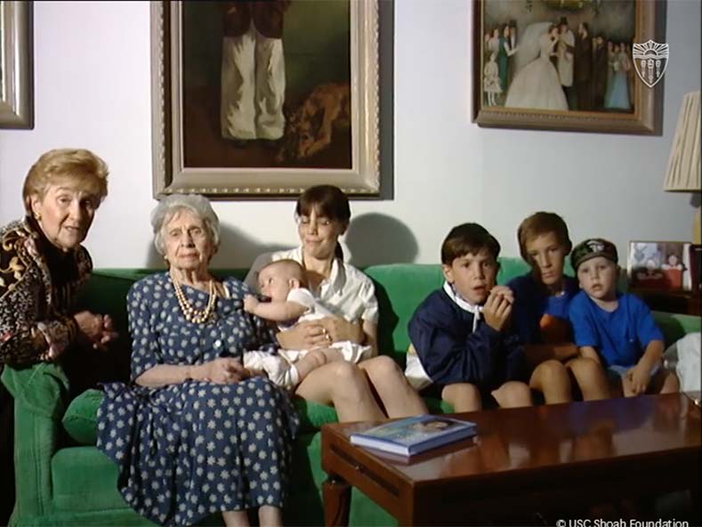 Rena Quint with her adoptive mother, Leah Globe, and her daughter and some of her grandchildren in 1998.