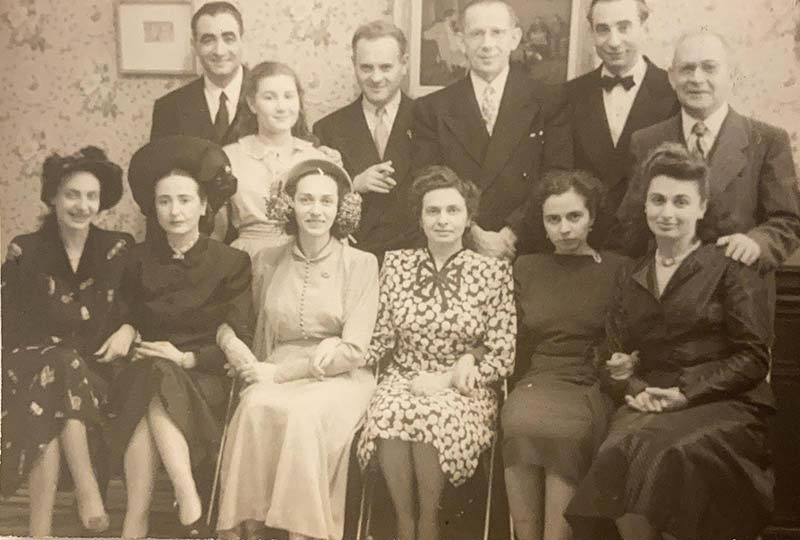 Rena Quint, back row, in 1948 at a wedding with the Globe family, which adopted her in 1946.