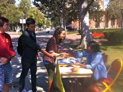 SFISA hosts an information table on Trousdale Parkway at USC.