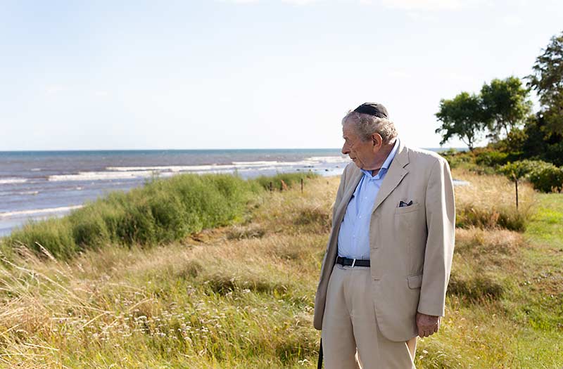 Rabbi Bent Melchior stands by the shores in Southern Sweden where his refugee boat arrived a harrowing night lost at sea during the 1943 rescue of the Danish Jews. Photo by Rachael Cerrotti / 2017