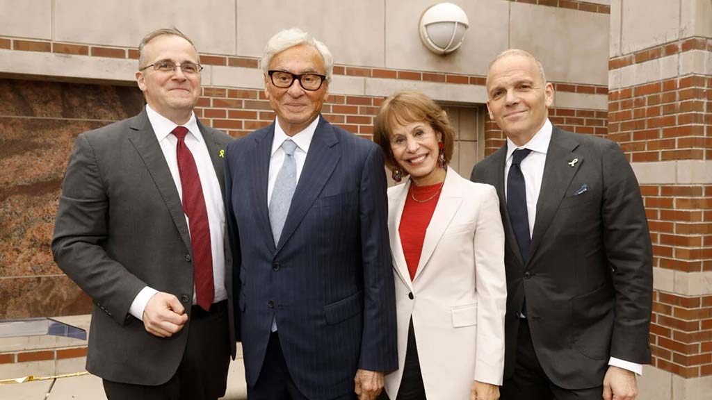 From left, USC Shoah Foundation CEO Robert Williams, Mickey Shapiro, USC President Carol Folt and Joel Citron, chair of the foundation’s Board of Councilors share a moment during Tuesday’s event. (USC Photo/Steve Cohn) From left, USC Shoah Foundation CEO Robert Williams, Mickey Shapiro, USC President Carol Folt and Joel Citron, chair of the foundation’s Board of Councilors share a moment during Tuesday’s event. (USC Photo/Steve Cohn)