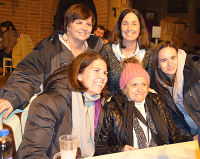 Tracy Sockalosky, bottom left, with Holocaust survivor Paula Lebovics, bottom center, and teachers during Auschwitz: The Past is Present