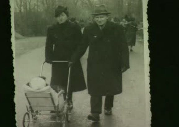 Allan and his parents in 1936.