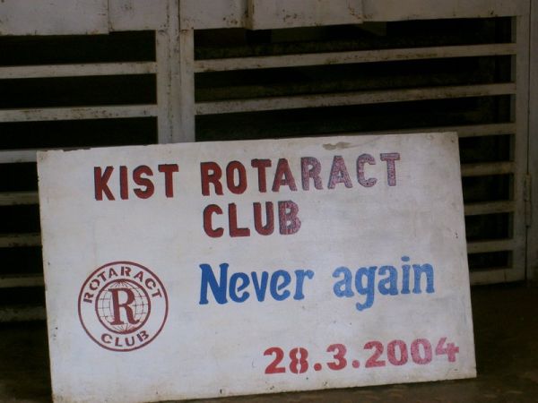 A sign commemorating the 10th Anniversary of the Rwanda Genocide, in a small town outside of Kigali. A sign commemorating the 10th Anniversary of the Rwanda Genocide, in a small town outside of Kigali.