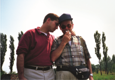 Andrew being comforted by his son, Lawrence, as he mourns the loss of his mother, Birkenau, 1994.