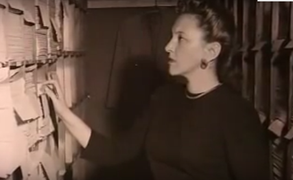 Belle Mayer in the I.G. Farben documents room at the Palace of Justice in Nuremberg, Germany.