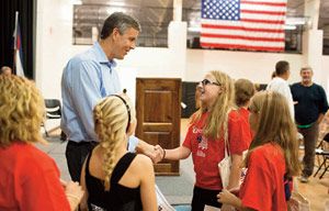 Duncan greets students. Duncan greets students.