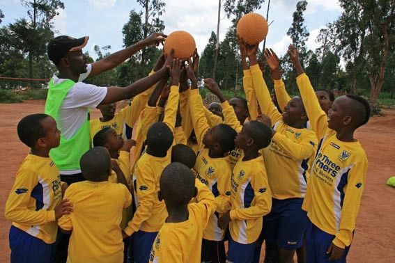 Eric Murangwa and members of his soccer club at Dream Team Football Academy in Kigali.