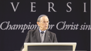 Andrew Burian shares his Holocaust story as the keynote speaker before a live audience of more than 13,000 students at a Liberty University Convocation, November 2014.