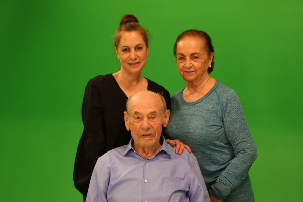 William Morgan with two members of his family during the filming of his Dimensions in Testimony interview.