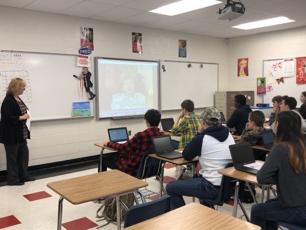 Students at Port Jervis High School in New York watch a clip of testimony before going to a free screening of 'Schindler's List.'