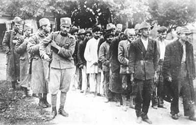 Serbian "gypsies" being marched to their execution, 1941 Serbian "gypsies" being marched to their execution, 1941