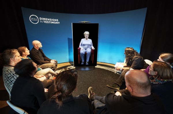 Visitors interact with Dimensions in Testimony at the Swedish History Museum’s “Speaking Memories” exhibit. (Photo: Erik Lernestål/National Historical Museums)